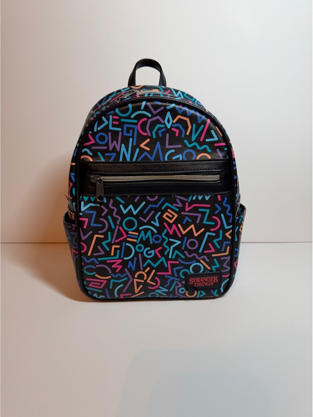 Stranger Things Women's Multicolor Geometric Lines Mini Black Backpack